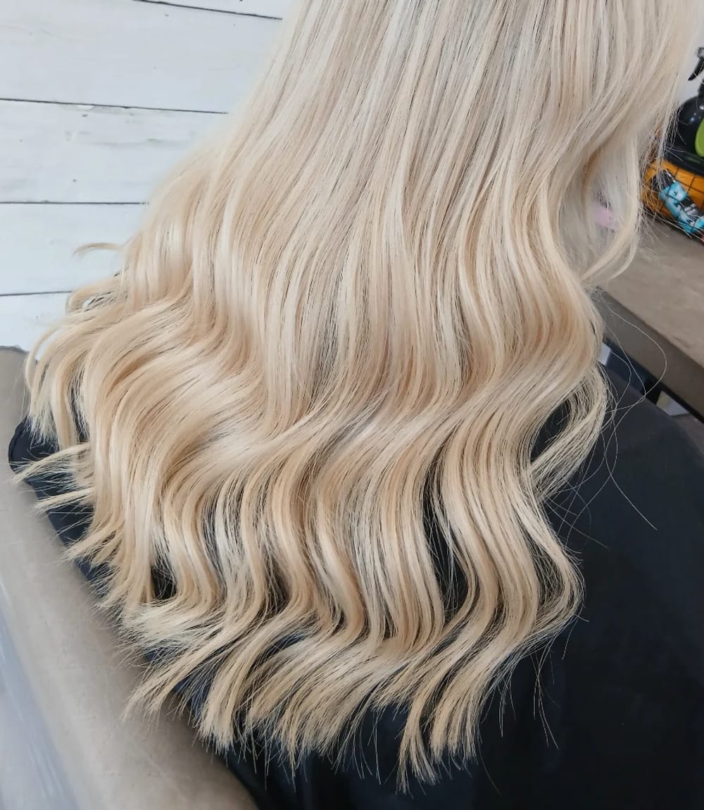 Long blonde waves after a full colour service at Dynamic