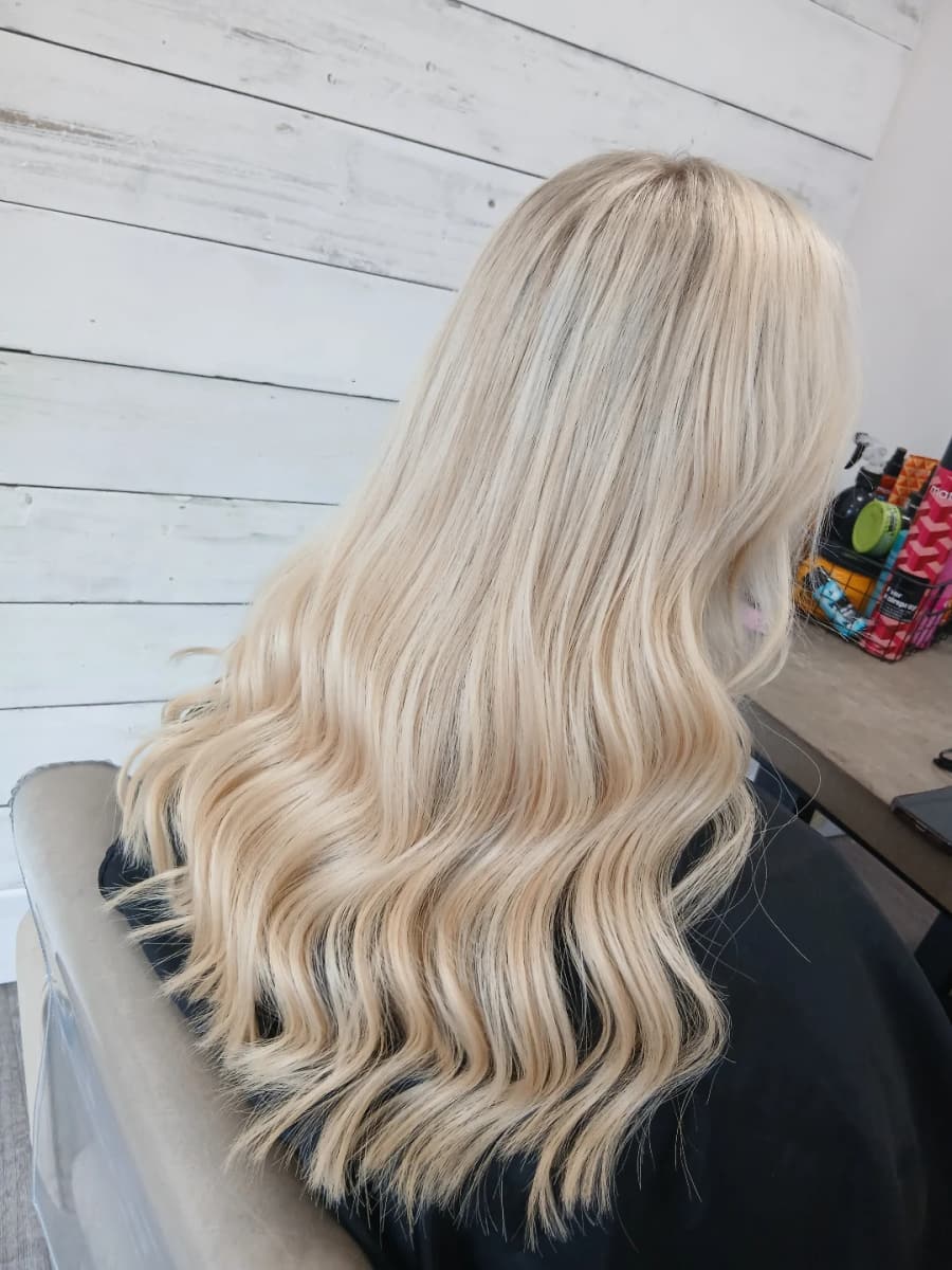Full head of soft blonde waves