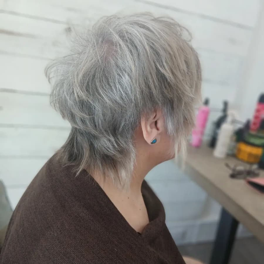 Choppy silver pixie cut